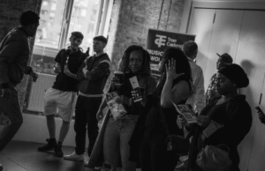 group-of-people-talking-at-an-event group-of-people-talking-at-an-event